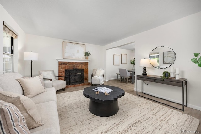 13275 W 63rd Pl, Arvada, CO 80004 - living area with wood finished floors and a fireplace