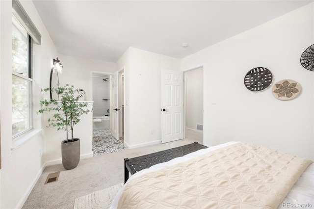 13275 W 63rd Pl, Arvada, CO 80004 - carpeted bedroom featuring baseboards and ensuite bathroom