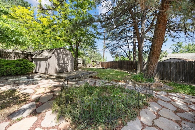 13275 W 63rd Pl, Arvada, CO 80004 - fenced backyard featuring a shed and a patio