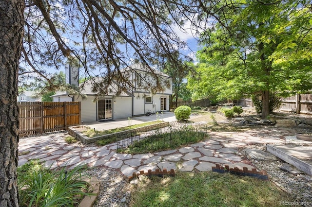 13275 W 63rd Pl, Arvada, CO 80004 - fenced backyard featuring a patio