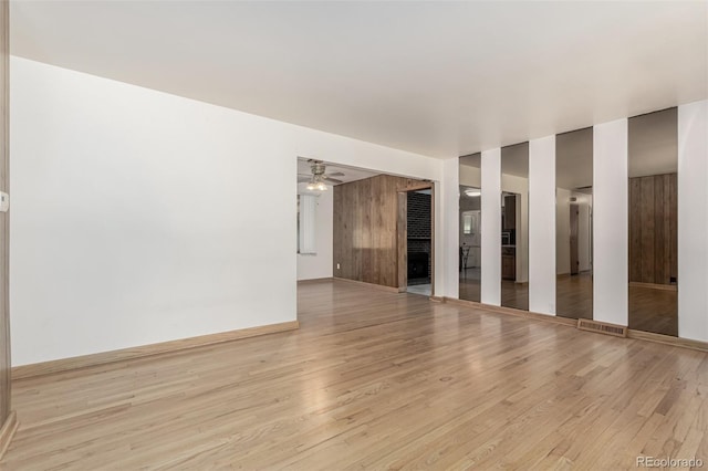 3334 W Grand Ave, Englewood, CO 80110 - spare room featuring wood finished floors and a ceiling fan