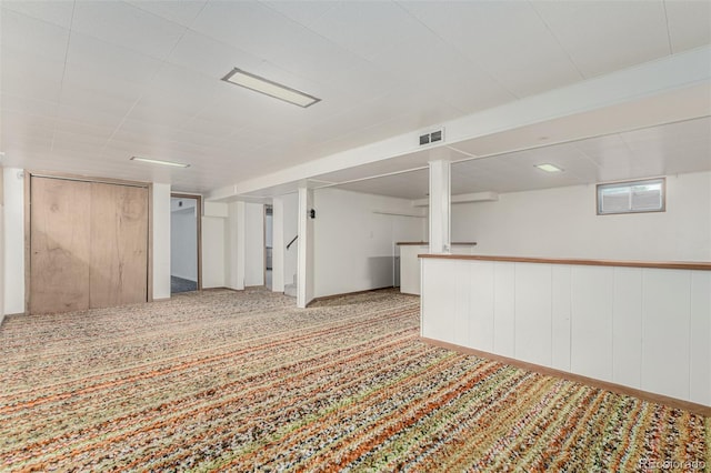 3334 W Grand Ave, Englewood, CO 80110 - below grade area featuring carpet floors and stairway