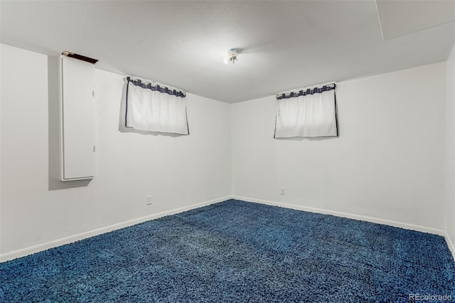3334 W Grand Ave, Englewood, CO 80110 - carpeted spare room featuring baseboards