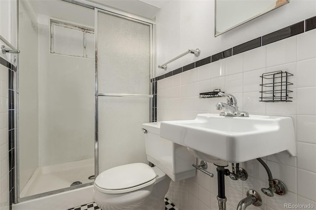 3334 W Grand Ave, Englewood, CO 80110 - full bath with tile walls and a stall shower