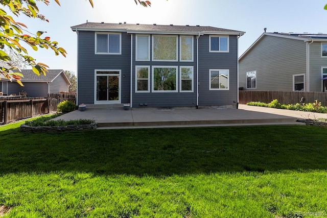 rear view of property with a patio