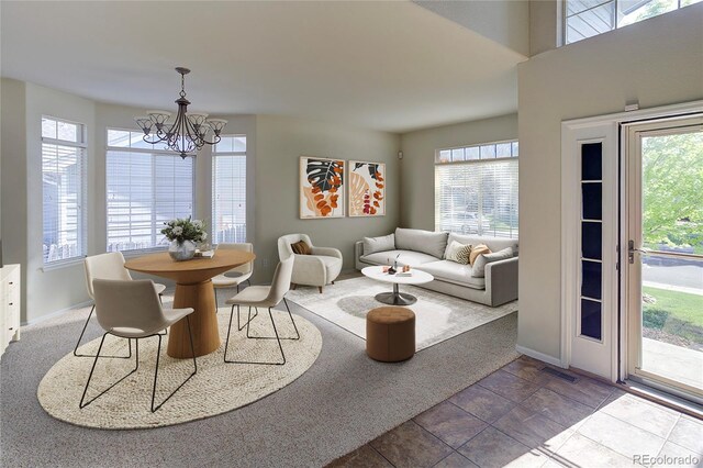331 Las Lomas St, Brighton, CO 80601 - dining space with a chandelier, healthy amount of natural light, and baseboards