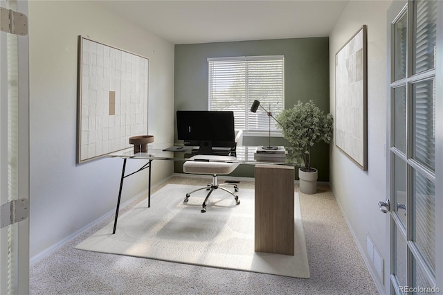331 Las Lomas St, Brighton, CO 80601 - home office featuring baseboards