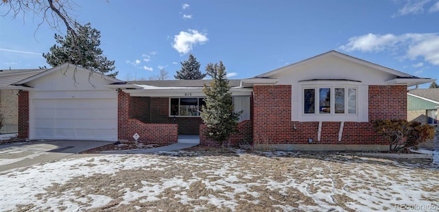 ranch-style house featuring a garage