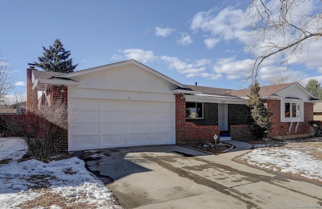 ranch-style house featuring a garage