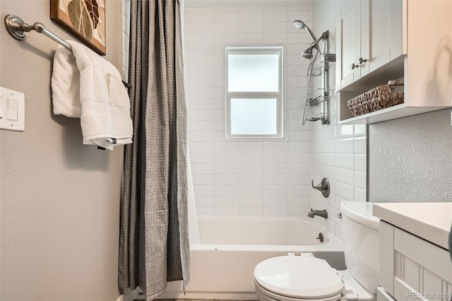 full bathroom with shower / bath combo, vanity, and toilet