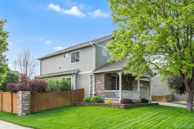 14794 Vine St, Thornton, CO 80602 - traditional home featuring covered porch and stone siding