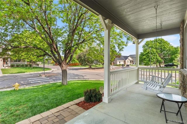 14794 Vine St, Thornton, CO 80602 - covered porch featuring a yard