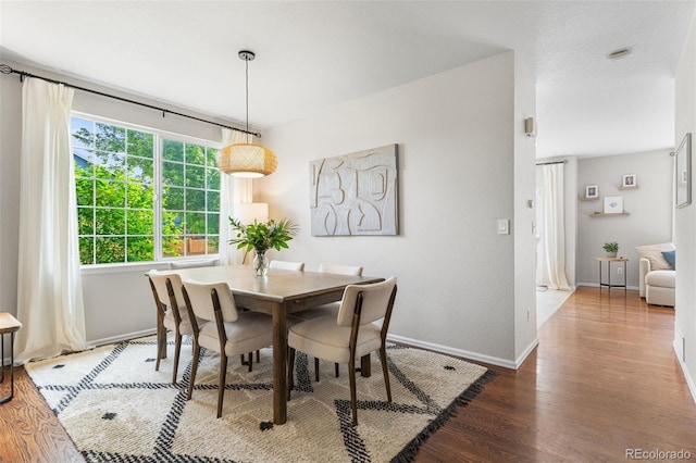 14794 Vine St, Thornton, CO 80602 - dining space featuring wood finished floors and baseboards