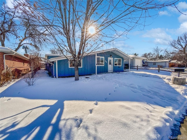 view of snow covered property