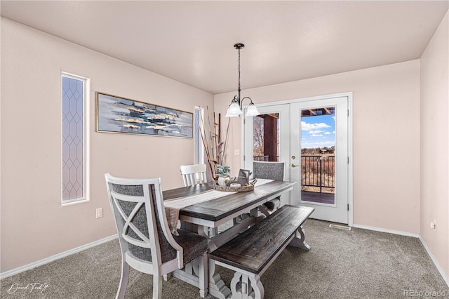 25 Tierra Casa Dr, Pueblo, CO 81005 - dining room with dark carpet and french doors