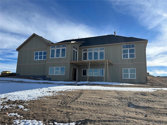 view of snow covered property