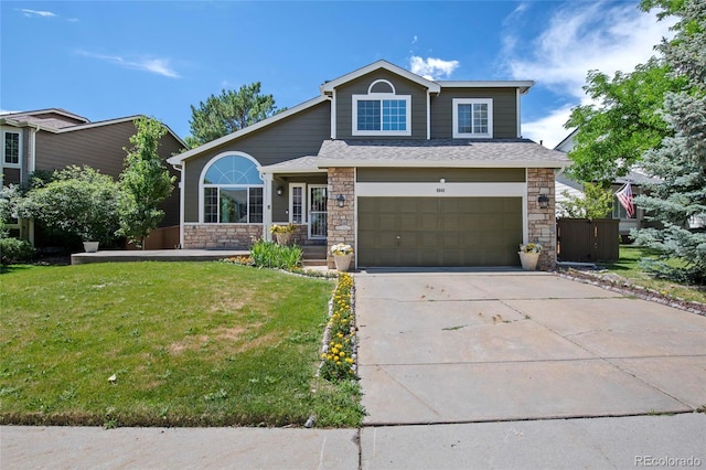 6846 Edgewood Way, Highlands Ranch, CO 80130 - view of front of house with stone siding, a garage, a front lawn, and concrete driveway