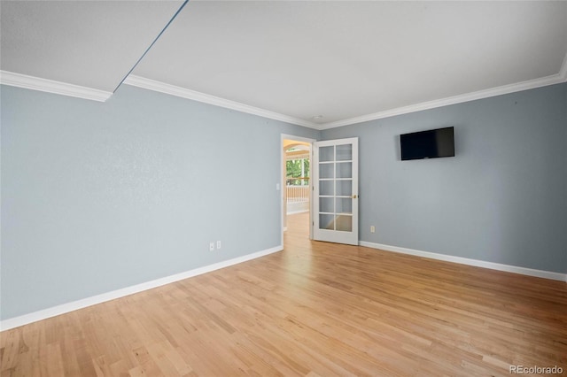 6846 Edgewood Way, Highlands Ranch, CO 80130 - spare room featuring crown molding and light wood-type flooring