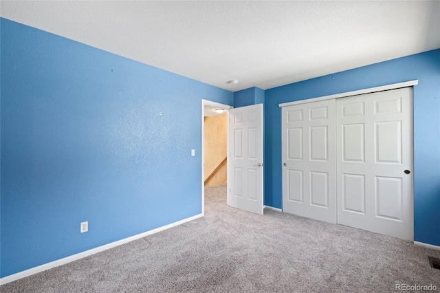 6846 Edgewood Way, Highlands Ranch, CO 80130 - unfurnished bedroom featuring carpet flooring and a closet