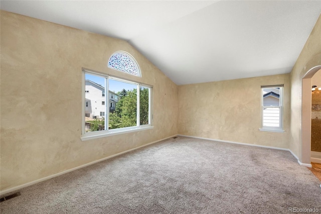 6846 Edgewood Way, Highlands Ranch, CO 80130 - carpeted spare room featuring vaulted ceiling and arched walkways