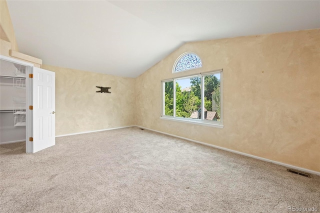 6846 Edgewood Way, Highlands Ranch, CO 80130 - unfurnished bedroom with vaulted ceiling and carpet