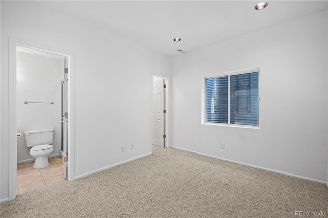 6846 Edgewood Way, Highlands Ranch, CO 80130 - unfurnished bedroom featuring carpet flooring, recessed lighting, and ensuite bathroom