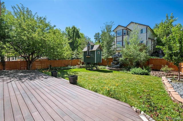 6846 Edgewood Way, Highlands Ranch, CO 80130 - wooden deck featuring a storage shed and a fenced backyard