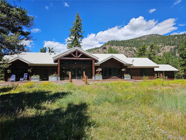 log home with a mountain view