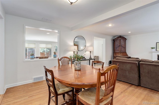 3090 S High St, Denver, CO 80210 - dining room featuring light wood-style flooring, recessed lighting, beam ceiling, and baseboards