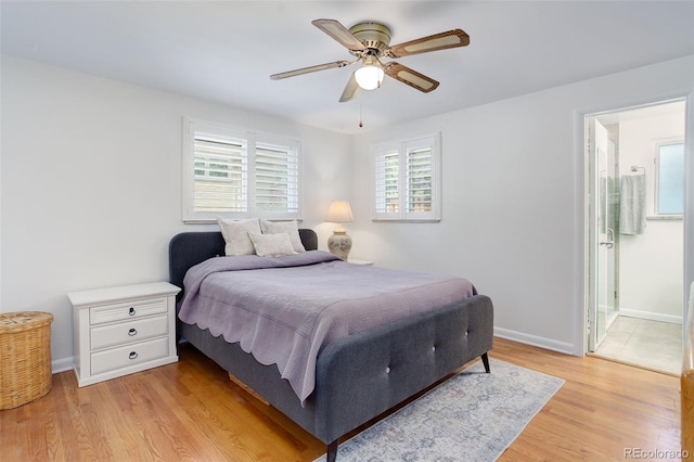 3090 S High St, Denver, CO 80210 - bedroom with light wood-style flooring, baseboards, ceiling fan, and ensuite bathroom