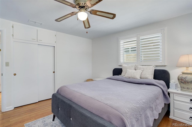 3090 S High St, Denver, CO 80210 - bedroom with light wood-style flooring, a closet, and ceiling fan