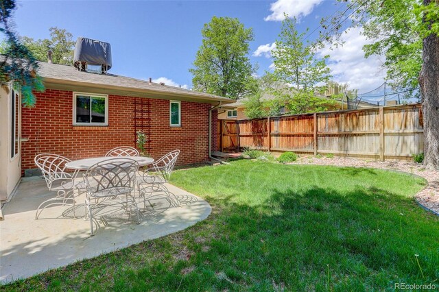 3090 S High St, Denver, CO 80210 - view of yard with a patio area