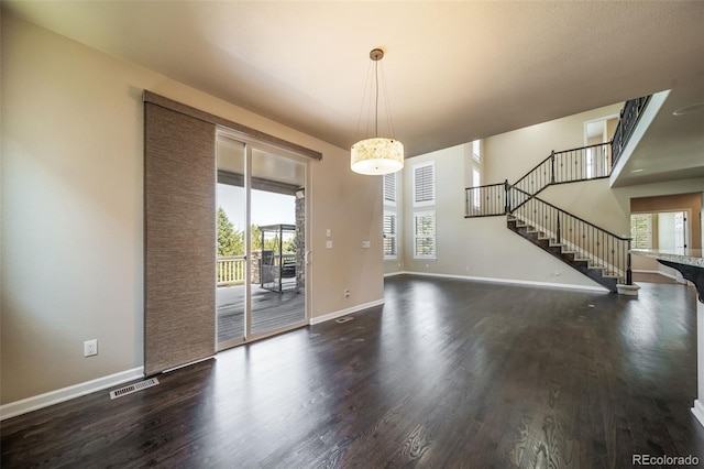 interior space with dark hardwood / wood-style floors