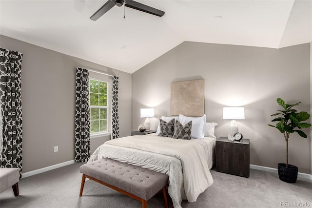 bedroom with vaulted ceiling, carpet, a ceiling fan, and baseboards