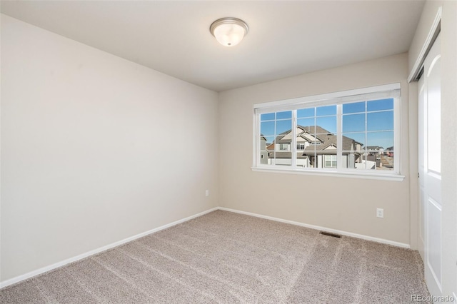 view of carpeted spare room