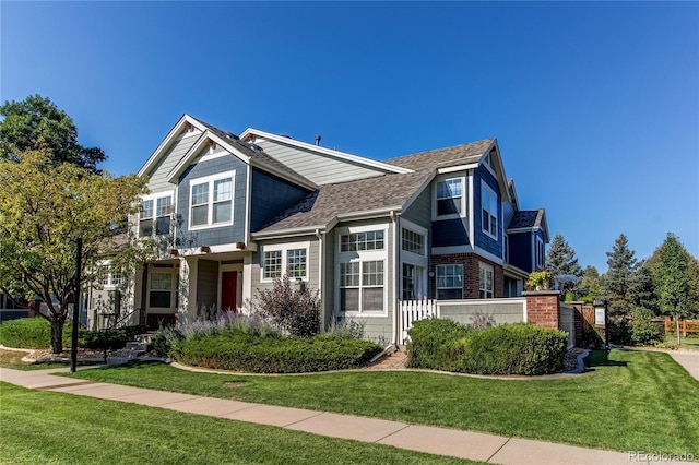 view of front of home with a front yard