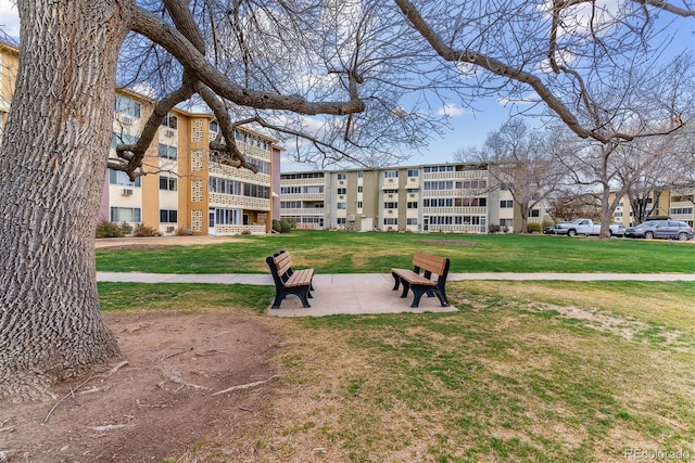 surrounding community featuring a lawn