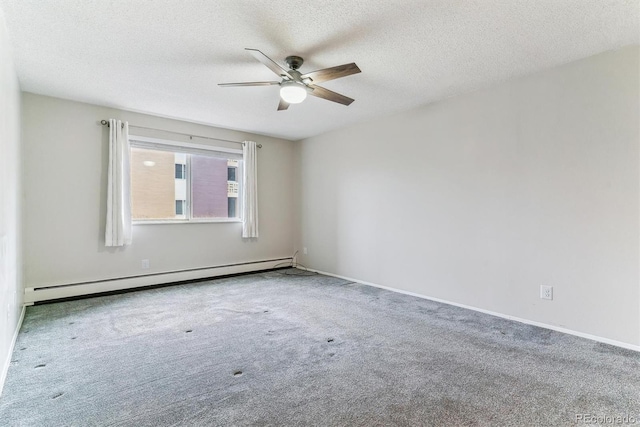9385 E Center Ave Unit 6A, Denver, CO 80247 - empty room featuring a baseboard heating unit, ceiling fan, carpet floors, a textured ceiling, and baseboards