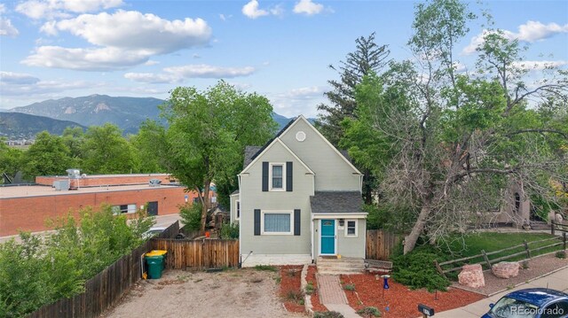 traditional-style house featuring a mountain view
