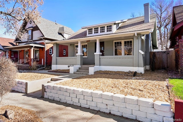 bungalow-style home with a porch