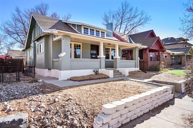 view of front of home featuring covered porch