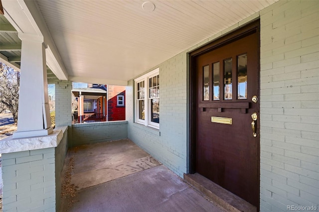 entrance to property with a porch