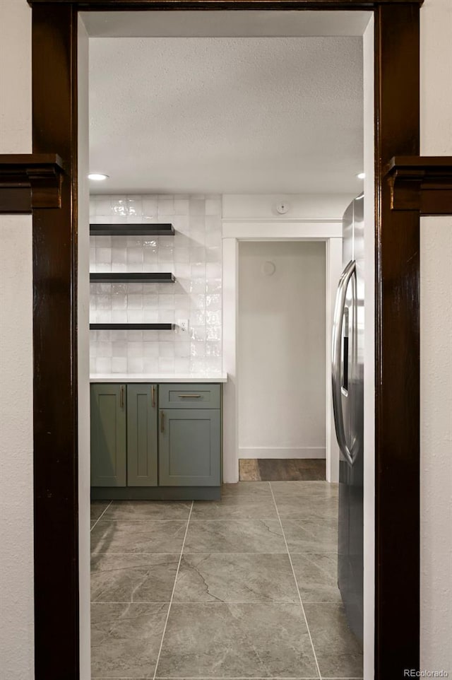 kitchen with a textured ceiling