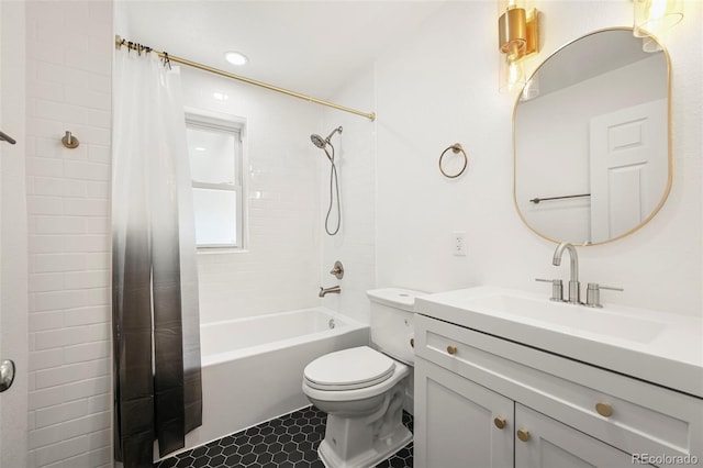 full bathroom featuring toilet, vanity, and shower / bath combo with shower curtain