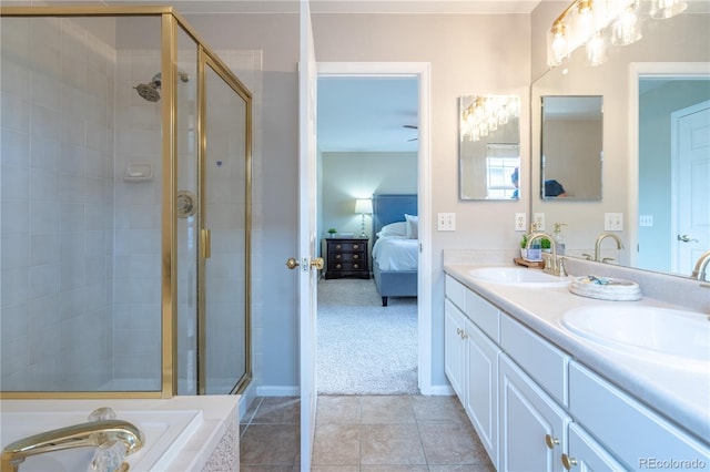 full bath with a sink, a stall shower, and connected bathroom