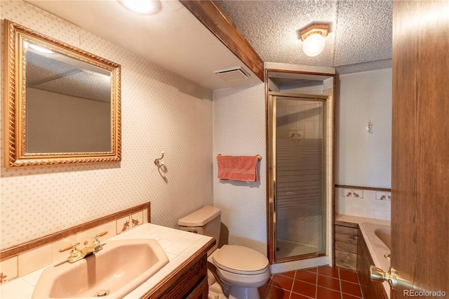 bathroom featuring wallpapered walls, tile patterned floors, a shower stall, toilet, and vanity