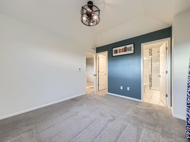 3921 E 141st Ave, Thornton, CO 80602 - unfurnished bedroom with carpet floors, baseboards, and ensuite bathroom