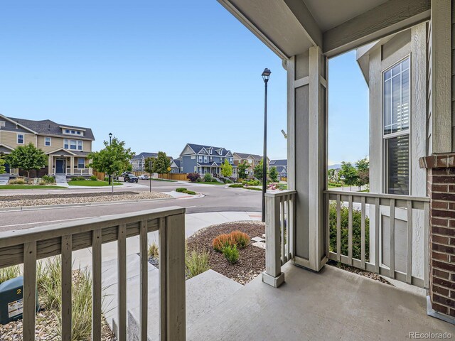 3921 E 141st Ave, Thornton, CO 80602 - porch featuring a residential view