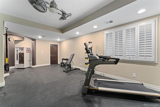 exercise area with recessed lighting and baseboards