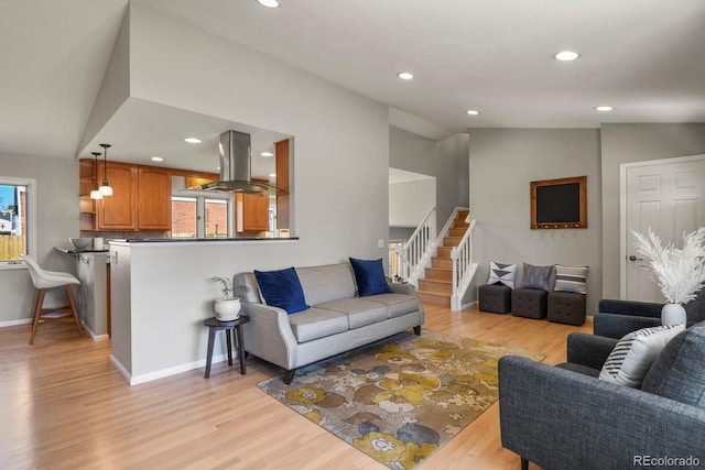 3785 E 134th Ct, Thornton, CO 80241 - living room with plenty of natural light, light wood-style floors, stairway, and recessed lighting